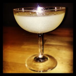 An image of the 21st Century cocktail submitted by n0tquitethere that contains Blanco Tequila, Crème de Cacao Blanc, Lemon and Absinthe