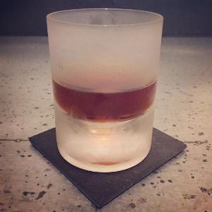 An image of the African Flower cocktail submitted by n0tquitethere that contains Bourbon, Amaro Ciociaro Liqueur, Crème de Cacao Blanc and Orange Bitters