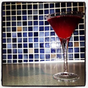 An image of the American Beauty cocktail submitted by n0tquitethere that contains Crème de Menthe, Orange, Grenadine, Dry Vermouth, Brandy and LBV Port