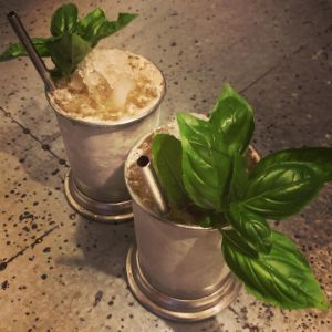 An image of the Beer Julep cocktail submitted by n0tquitethere that contains Bourbon, Sloe Gin, Lemon, Simple Syrup, Basil and Pale Ale
