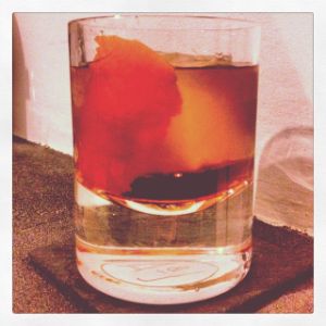 An image of the Berlioni cocktail submitted by n0tquitethere that contains London Dry Gin, Cynar, Dry Vermouth and Orange