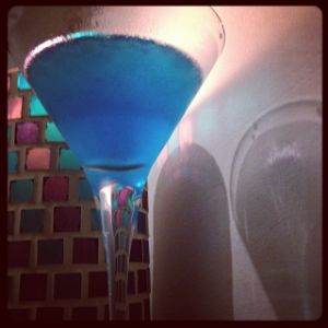 An image of the Breeze cocktail submitted by n0tquitethere that contains Kirschwasser, Blue Curaçao, White Rum, Maraschino Liqueur and Lemon