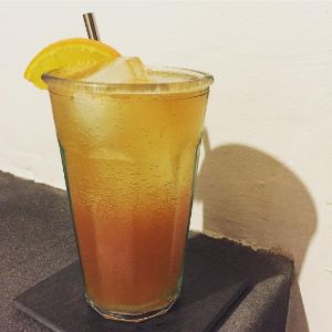 An image of the Cadiz Collins cocktail submitted by n0tquitethere that contains Orange, Whiskey Barrel Aged Bitters, London Dry Gin, Amontillado Sherry, Lemon, Demerara Syrup and Soda Water