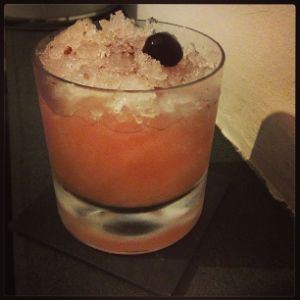 An image of the Cherry Pop cocktail submitted by n0tquitethere that contains London Dry Gin, Lemon, Maraschino Liqueur, Simple Syrup and Cherries
