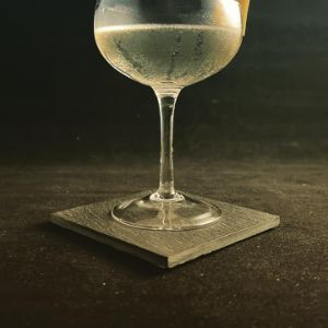 An image of the Crisp Herbal Retreat cocktail submitted by n0tquitethere that contains Dry Riesling, Dry Vermouth, Celery Bitters, Absinthe and Lemon