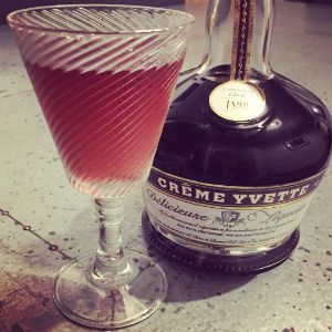An image of the Crystal Slipper Cocktail cocktail submitted by n0tquitethere that contains London Dry Gin, Crème Yvette and Orange Bitters