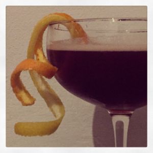 An image of the Dandy cocktail submitted by n0tquitethere that contains Rye Whiskey, Dubonnet Rouge, Angostura Bitters, Curaçao Triple Sec, Lemon and Orange