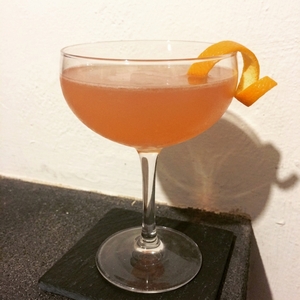 An image of the Deep Blue Sea cocktail submitted by Toby that contains London Dry Gin, Quinquina, Crème de Violette and Orange