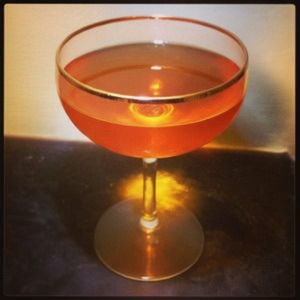 An image of the Dogfight cocktail submitted by Toby that contains Bourbon, Amaro Nonino, Aperol, Orange Bitters and Lemon