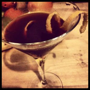 An image of the Dragon's Mouth cocktail submitted by n0tquitethere that contains Gold Rum, Bianco Vermouth, Curaçao Triple Sec, Angostura Bitters and Grapefruit