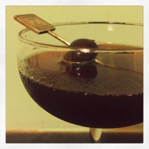 An image of the Dubonnet Manhatten cocktail submitted by n0tquitethere that contains Bourbon, Dubonnet Rouge, Angostura Bitters and Cocktail Cherry