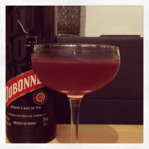An image of the Flowers of Distinction cocktail submitted by n0tquitethere that contains Mezcal, Dubonnet Rouge, St Germain, Lemon and Absinthe