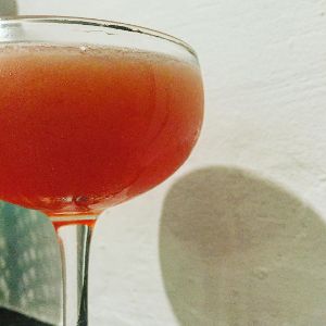 An image of the Framboise Fizz cocktail submitted by n0tquitethere that contains Reposado Tequila, Crème de Cacao Blanc, Lemon and Raspberry Lambic