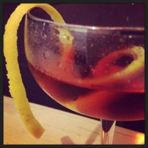 An image of the Grand Street cocktail submitted by n0tquitethere that contains London Dry Gin, Punt e Mes, Maraschino Liqueur, Cynar and Grapefruit