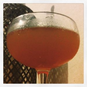 An image of the Green Deacon cocktail submitted by n0tquitethere that contains London Dry Gin, Grapefruit, Sloe Gin and Absinthe