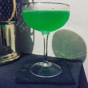 An image of the Green Dragon Cocktail cocktail submitted by n0tquitethere that contains London Dry Gin, Kümmel, Crème de Menthe, Lemon and Orange Bitters
