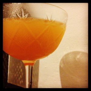 An image of the How Zat cocktail submitted by n0tquitethere that contains White Rum, Apple Brandy, Orange and Angostura Bitters