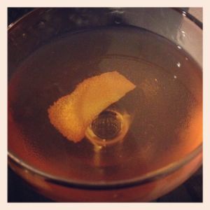 An image of the Improved Tequila Cocktail cocktail submitted by n0tquitethere that contains Reposado Tequila, Maraschino Liqueur, Xocolatl Mole Bitters, Angostura Bitters, Agave Syrup and Lemon
