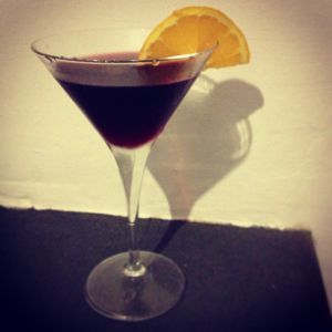 An image of the Jersey Devil cocktail submitted by n0tquitethere that contains Homemade English Bishop, Apple Brandy, Apple Schnapps, Peychauds Bitters and Orange