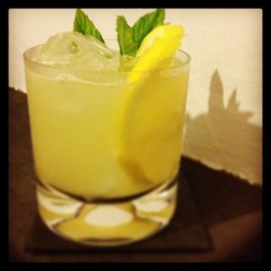 An image of the Kyoto Sour cocktail submitted by n0tquitethere that contains Grapefruit, Hot Sauce, Sake, Lemon, Agave Syrup and Mint