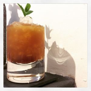 An image of the Midnight Stinger cocktail submitted by n0tquitethere that contains Bourbon, Fernet Branca, Lemon, Simple Syrup and Mint