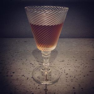 An image of the Mikado Cocktail cocktail submitted by n0tquitethere that contains Brandy, Aromatic Bitters, Crème de Cacao Blanc and Curaçao Triple Sec
