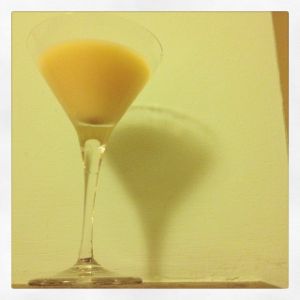 An image of the Night Light cocktail submitted by n0tquitethere that contains White Rum, Curaçao Triple Sec and Egg