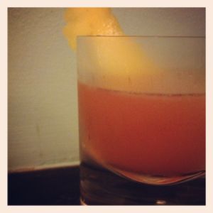An image of the Oaxacan Standoff cocktail submitted by n0tquitethere that contains Mezcal, Aperol, Amontillado Sherry, Agave Syrup, Lime and Grapefruit