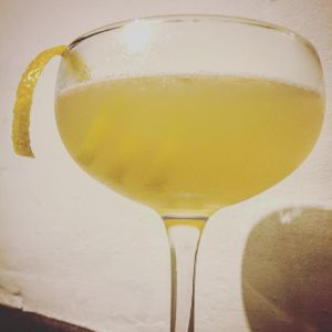 An image of the Old McIntyre cocktail submitted by n0tquitethere that contains Cognac, Curaçao Triple Sec, Quinquina, Lemon and Lemon