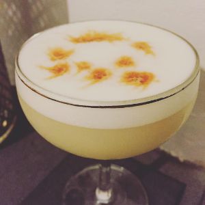 An image of the Pisco Sour cocktail submitted by n0tquitethere that contains Pisco, Lime, Simple Syrup, Egg and Angostura Bitters