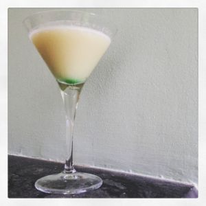 An image of the Platinum Blonde cocktail submitted by n0tquitethere that contains Pineapple Juice, Apple Brandy, Orgeat Syrup and Crème de Menthe