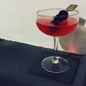 An image of the Rose cocktail submitted by n0tquitethere that contains Dry Vermouth, Kirschwasser, Raspberry Preserve and Cocktail Cherry