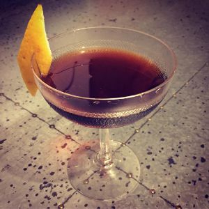 An image of the Shriner Cocktail cocktail submitted by n0tquitethere that contains Brandy, Sloe Gin, Aromatic Bitters, Simple Syrup and Lemon