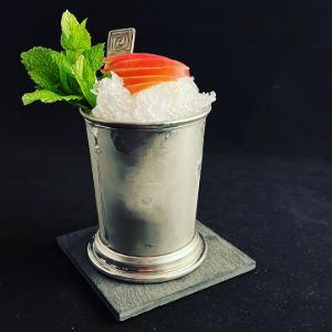 An image of the Smoked Julep cocktail submitted by n0tquitethere that contains Single Malt Scotch, Apple Brandy, Maple Syrup, Apple and Mint