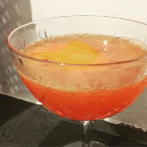An image of the South Beach cocktail submitted by n0tquitethere that contains Orange, Turin Bitters, Amaretto and Orange