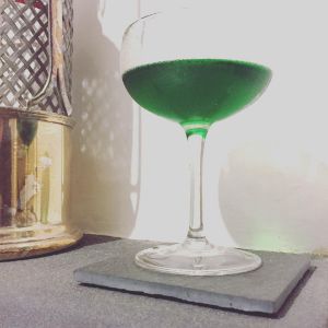 An image of the St. Patrick's Day Cocktail cocktail submitted by n0tquitethere that contains Crème de Menthe, Green Chartreuse, Irish Whiskey and Aromatic Bitters