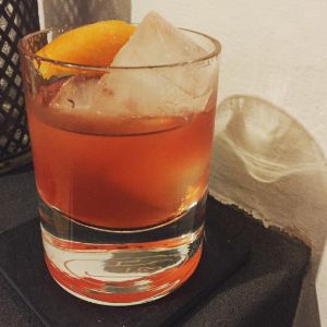 An image of the Tarzan Boy cocktail submitted by n0tquitethere that contains Agricole Rhum, Dry Vermouth, Turin Bitters, Passion Fruit Syrup, Simple Syrup and Orange
