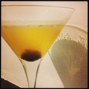 An image of the The Westie cocktail submitted by n0tquitethere that contains Irish Whiskey, Drambuie, Galliano L'authentico, Lemon, Angostura Bitters and Cocktail Cherry