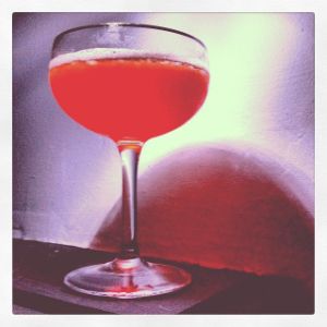 An image of the Tiger Blood cocktail submitted by n0tquitethere that contains Turin Bitters, Cherry Brandy, Lemon and Lemon