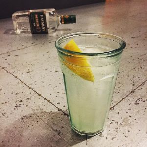 An image of the Tom Collins cocktail submitted by n0tquitethere that contains Old Tom Gin, Lemon, Simple Syrup, Soda Water and Lemon