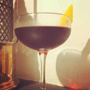 An image of the Urban Anxiety cocktail submitted by n0tquitethere that contains Cachaça, Sweet Vermouth, Cynar, Angostura Bitters and Grapefruit