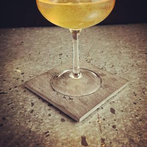 An image of the Velvet Club cocktail submitted by n0tquitethere that contains Cognac, Lillet Blanc, Crème de Cacao Blanc and Champagne