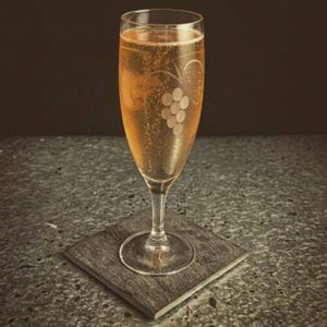 An image of the Well Baked Tart cocktail submitted by Toby that contains Cherry Brandy, Amaretto and Champagne